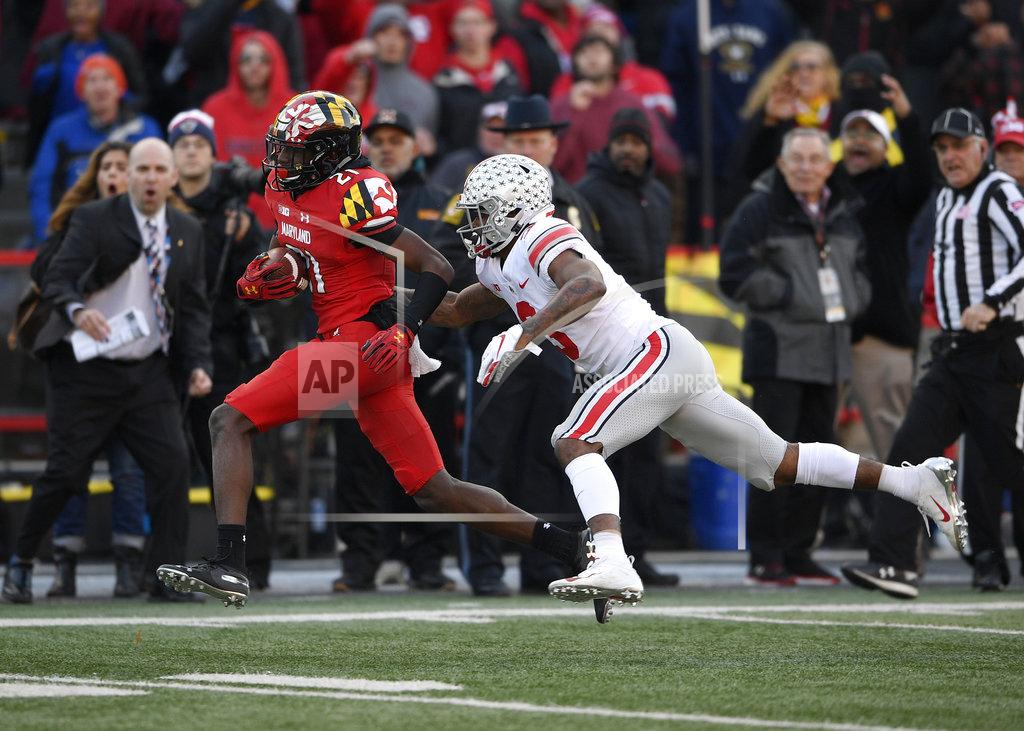 Nick Wass Maryland wide receiver Darryl Jones (21) runs with the ball against Ohio State cornerback Damon Arnette (3) during the second half of an NCAA football game, Saturday, Nov. 17, 2018, in College Park, Md. Ohio State won 52-51 in overtime. (AP Photo/Nick Wass)