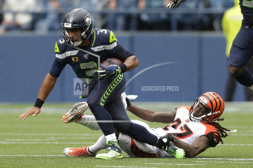 Stephen Brashear Seattle Seahawks quarterback Russell Wilson is sacked by Cincinnati Bengals cornerback Dre Kirkpatrick, right, during the second half of an NFL football game Sunday, Sept. 8, 2019, in Seattle. (AP Photo/Stephen Brashear)