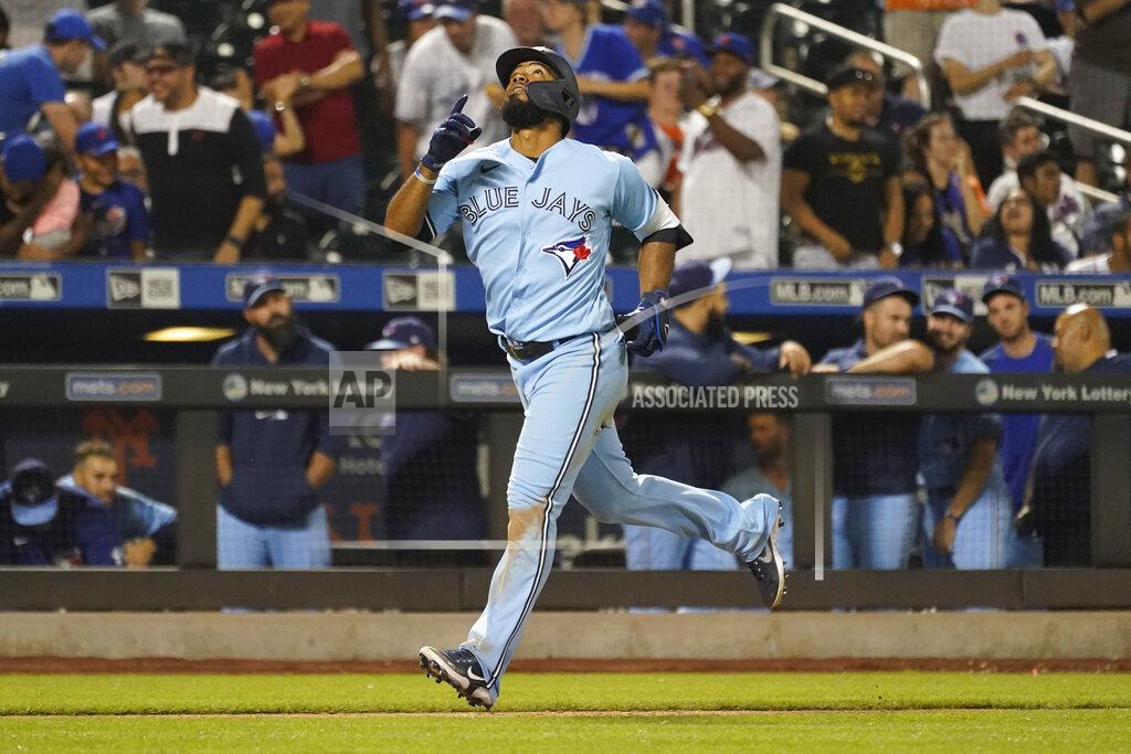 Mary Altaffer Toronto Blue Jays' Teoscar Hernandez gestures as he runs the bases after hitting a two-run home run during the ninth inning of a baseball game against the New York Mets, Saturday, July 24, 2021, in New York. (AP Photo/Mary Altaffer)