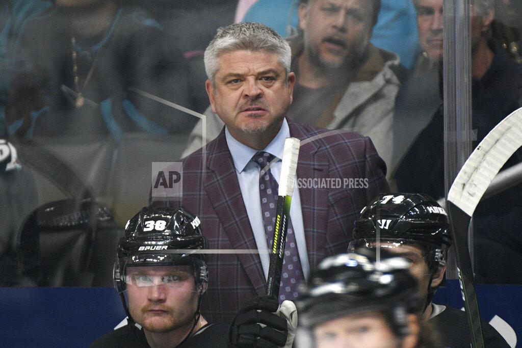 Michael Owen Baker FILE - Los Angeles Kings head coach Todd McLellan, center, is shown during an NHL hockey game against the San Jose Sharks in Los Angeles, in this Monday, Nov. 25, 2019, file photo. The Kings made improvements last season in McLellan's first year as coach. (AP Photo/Michael Owen Baker, File)