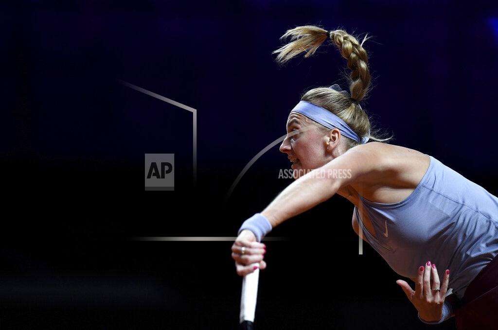 Thomas Kienzle Petra Kvitova of the Czech Republic serves the ball to Jennifer Brady of the United States during their match at the WTA tennis tournament in Stuttgart, Germany, Tuesday, April 20, 2021. (Thomas Kienzle/Pool via AP)
