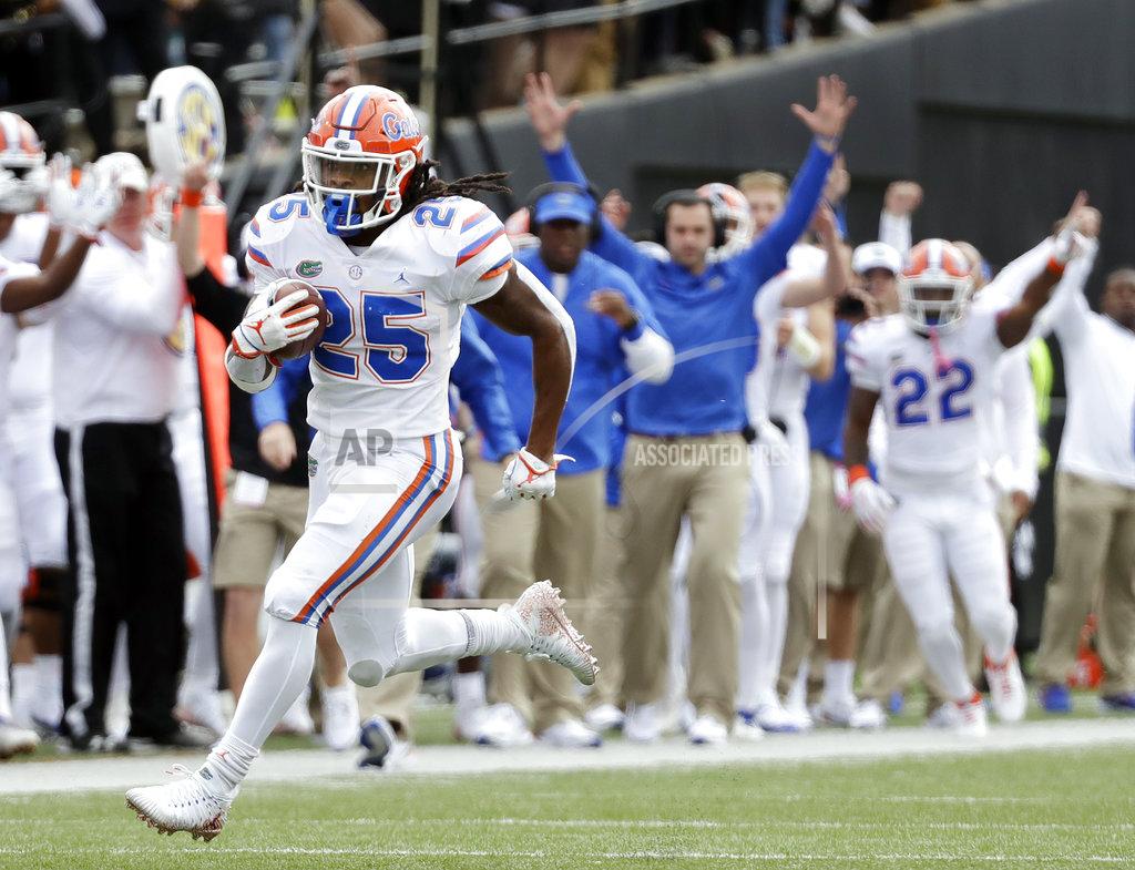 Mark Humphrey Florida running back Jordan Scarlett (25) runs 48-yards for a touchdown against Vanderbilt in the second half of an NCAA college football game Saturday, Oct. 13, 2018, in Nashville, Tenn. (AP Photo/Mark Humphrey)