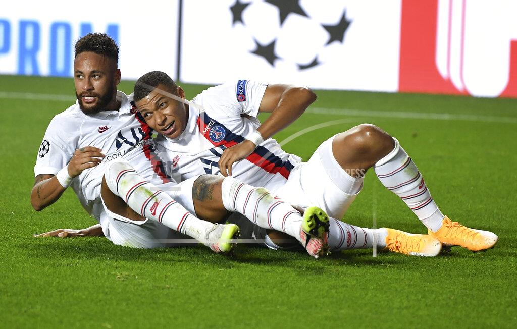 David Ramos PSG's Neymar, left, celebrates with Kylian Mbappe after teammate Eric Maxim Choupo-Moting scored his team's second goal during the Champions League quarterfinal match between Atalanta and PSG at Luz stadium, Lisbon, Portugal, Wednesday, Aug. 12, 2020. (David Ramos/Pool Photo via AP)