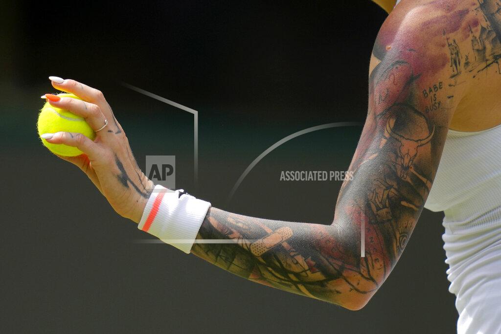 Kirsty Wigglesworth Tereza Martincova of the Czech Republic prepares to serve to Karolina Pliskova of the Czech Republic in a singles tennis match on day three of the Wimbledon tennis championships in London, Wednesday, June 29, 2022. (AP Photo/Kirsty Wigglesworth)