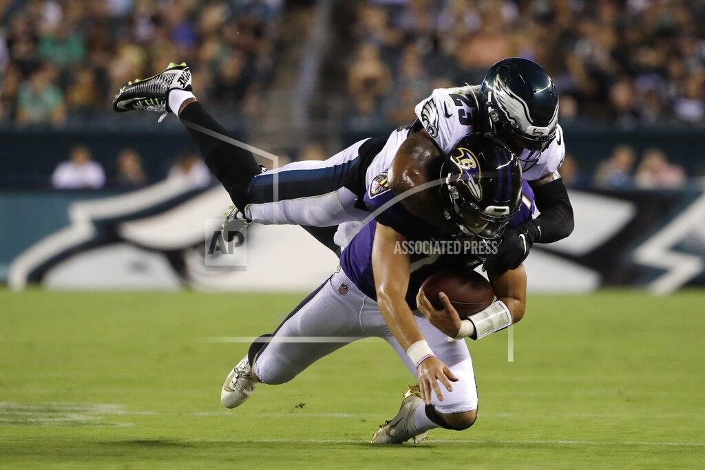Matt Rourke Philadelphia Eagles' Rodney McLeod, top, tackles Baltimore Ravens' Trace McSorley during the first half of a preseason NFL football game Thursday, Aug. 22, 2019, in Philadelphia. (AP Photo/Matt Rourke)