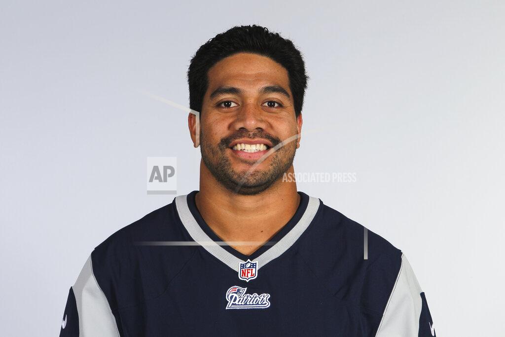 Uncredited FILE - This is a 2012 file photo of Jonathan Fanene of the New England Patriots NFL football team. Court filings allege former Cincinnati Bengals defensive end Jonathan Fanene faces charges used a pipe, golf club and broom handle to assault his wife and his sister over allegations he had an extramarital affair while on a trip to Hawaii. Fanene has been charged in the District Court of American Samoa with eight felonies, including kidnapping and assault, and five misdemeanors. He has been released on $100,000 bail and will appear in court next week. (AP Photo/File)