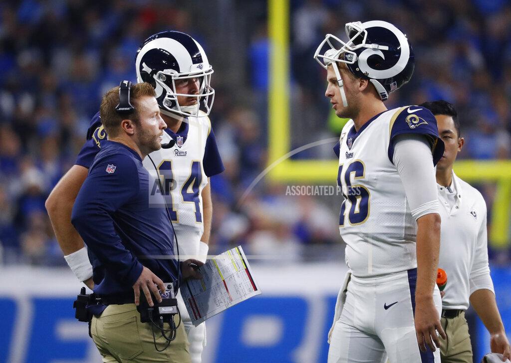 FILE - In this Dec. 2, 2018, file photo, Los Angeles Rams quarterback Jared Goff (16) talks with coach Sean McVay and Sean Mannion (14) during the team's NFL football game against the Detroit Lions in Detroit. Goff is determined to show what he learned from last season's playoff loss when the Rams (13-3) begin another postseason run after their bye week. The Rams will host Chicago, Seattle or Dallas on Jan. 12 when the franchise attempts to advance to its first NFC championship game since the 2001 campaign--which was also the season of the Rams’ last Super Bowl appearance .(AP Photo/Paul Sancya, File)