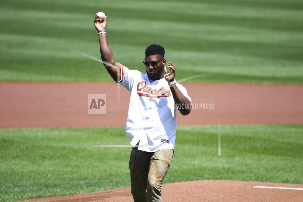 Terrance Williams Baltimore Ravens' Tyus Bowser throws out the ceremonial first pitch before a baseball game between the Baltimore Orioles and the Tampa Bay Rays, Sunday, Aug. 8, 2021, in Baltimore. (AP Photo/Terrance Williams)