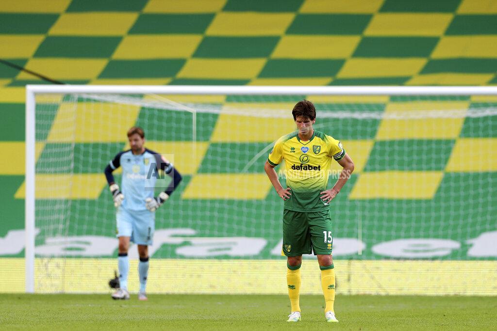 Mike Egerton Norwich City's Timm Klose dejects after Southampton's Nathan Redmond scored his side's third goal during the English Premier League soccer match between Norwich City and Southampton at Carrow Road in Norwich, England, Friday, June 19, 2020. (AP Photo/Mike Egerton/Pool)