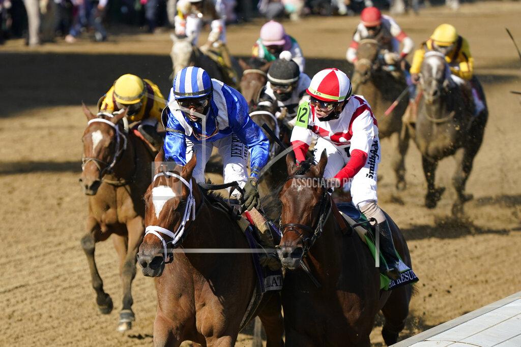 Jeff Roberson John Velazquez, left, rides Malathaat to victory during the 147th running of the Kentucky Oaks at Churchill Downs, Friday, April 30, 2021, in Louisville, Ky. (AP Photo/Jeff Roberson)