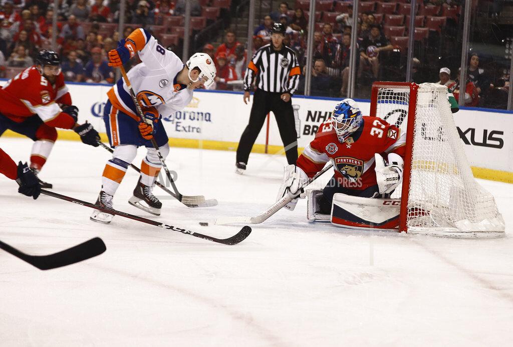 Brynn Anderson Florida Panthers goaltender Samuel Montembeault (33) saves a goal against New York Islanders left wing Anthony Beauvillier (18) during the first period of an NHL hockey game against the, Thursday, April 4, 2019, in Sunrise, Fla. (AP Photo/Brynn Anderson)