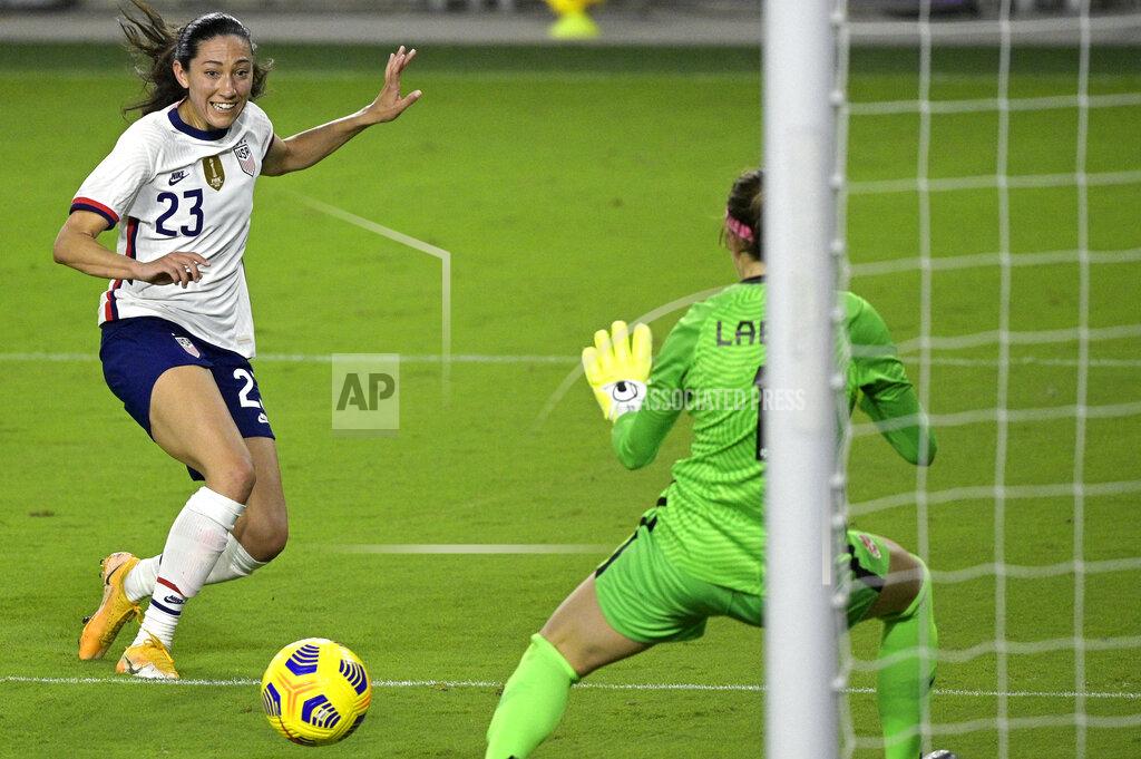 Phelan M. Ebenhack United States forward Christen Press (23) attempts a shot that is blocked by Canada goalkeeper Stephanie Labbe (1) during the second half of a SheBelieves Cup women's soccer match, Thursday, Feb. 18, 2021, in Orlando, Fla. (AP Photo/Phelan M. Ebenhack)