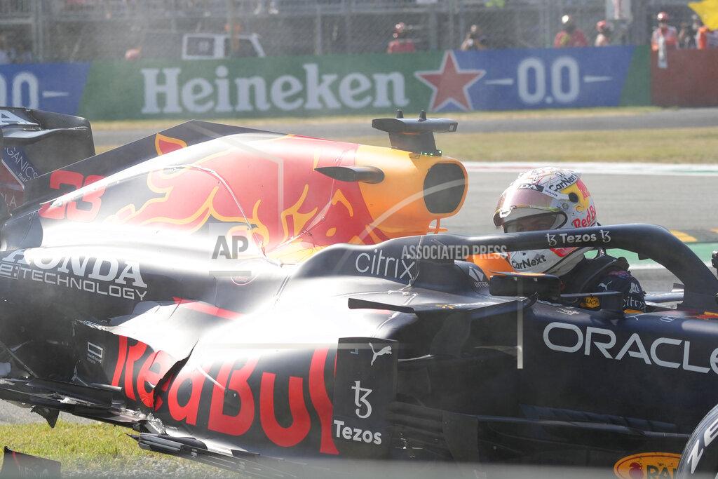 Luca Bruno Red Bull driver Max Verstappen of the Netherlands looks out after crashing with Mercedes driver Lewis Hamilton of Britain during the Italian Formula One Grand Prix, at Monza racetrack, in Monza, Italy, Sunday, Sept.12, 2021. (AP Photo/Luca Bruno)