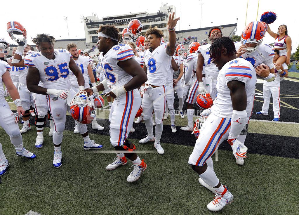 Mark Humphrey Florida players celebrate after defeating Vanderbilt 37-27 in an NCAA college football game Saturday, Oct. 13, 2018, in Nashville, Tenn. (AP Photo/Mark Humphrey)