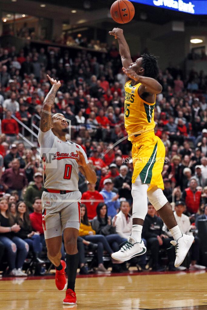 Brad Tollefson Baylor's Davion Mitchell (45) blocks the pass by Texas Tech's Kyler Edwards (0) during the first half of an NCAA college basketball game Tuesday, Jan. 7, 2020, in Lubbock, Texas. (AP Photo/Brad Tollefson)
