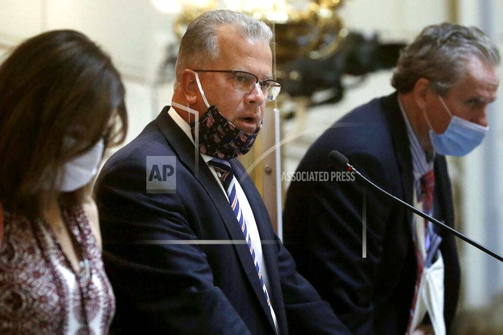 Steven Senne FILE - In this June 17, 2020, file photo, Rhode Island Speaker of the House Nicholas Mattiello, center, addresses the House Chamber during a legislative session at the Statehouse, in Providence, R.I. Mattiello, one of the state's most powerful politicians who had been dogged by scandal allegations, lost reelection to Republican activist Barbara Ann Fenton-Fung, wife of Cranston Mayor Allan Fung, in the November general election. (AP Photo/Steven Senne, FIle)