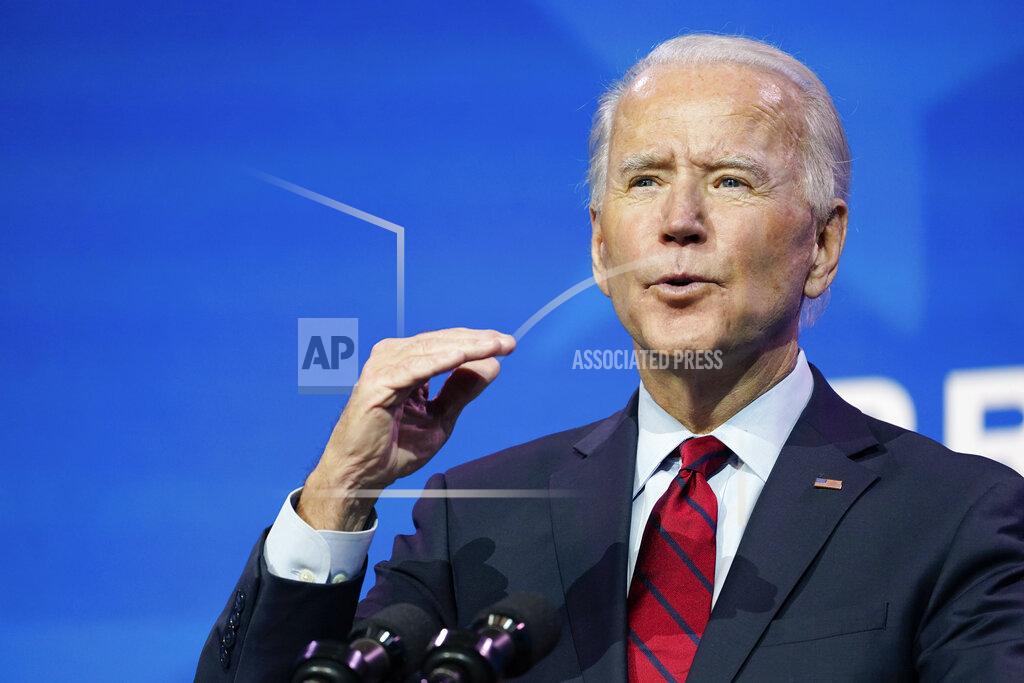 Susan Walsh President-elect Joe Biden speaks during an event at The Queen theater in Wilmington, Del., Tuesday, Dec. 8, 2020, to announce his health care team. (AP Photo/Susan Walsh)