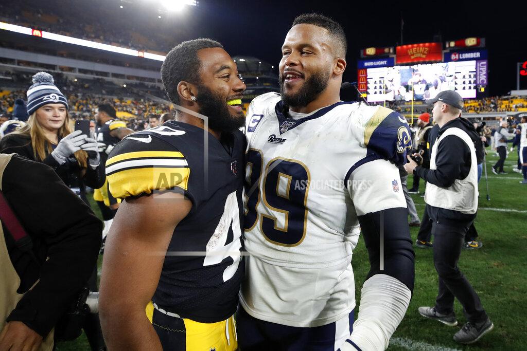 Don Wright Pittsburgh Steelers running back Tony Brooks-James, left, and Los Angeles Rams defensive tackle Aaron Donald (99) visit on the field following an NFL football game in Pittsburgh, Sunday, Nov. 10, 2019. The Steelers won 17-12. (AP Photo/Don Wright)