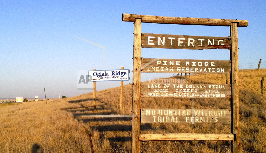 Kristi Eaton FILE - This Sept. 9, 2012 file photo shows The entrance to the Pine Ridge Indian Reservation in South Dakota, home to the Oglala Sioux tribe is viewed on Sept. 9, 2012. A U.S. Supreme Court ruling expanding state authority to prosecute some crimes on Native American land is upending decades of law in support of tribal sovereignty. (AP Photo/Kristi Eaton, File)