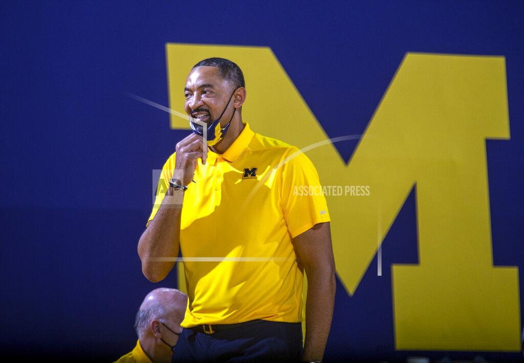 Tony Ding Michigan head coach Juwan Howard reacts courtside in the second half of an NCAA college basketball game against Minnesota at Crisler Center in Ann Arbor, Mich., Wednesday, Jan. 6, 2021. (AP Photo/Tony Ding)
