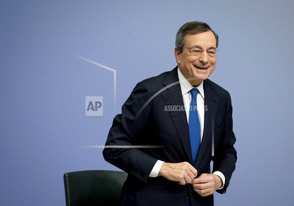 Michael Probst FILE - in this Thursday, Oct. 24, 2019 file photo, President of European Central Bank Mario Draghi stands up on the podium after a press conference after chairing his last policy meeting in Frankfurt, Germany. Italy's weary president on Wednesday, Feb. 3, 2021 tapped "Super Mario," arguably the world's most famous Italian, to resolve a festering political crisis that threatens the ability of the eurozone's third-largest economy to manage the coronavirus pandemic and recover from the worst recession since World War II. (AP Photo/Michael Probst, File)