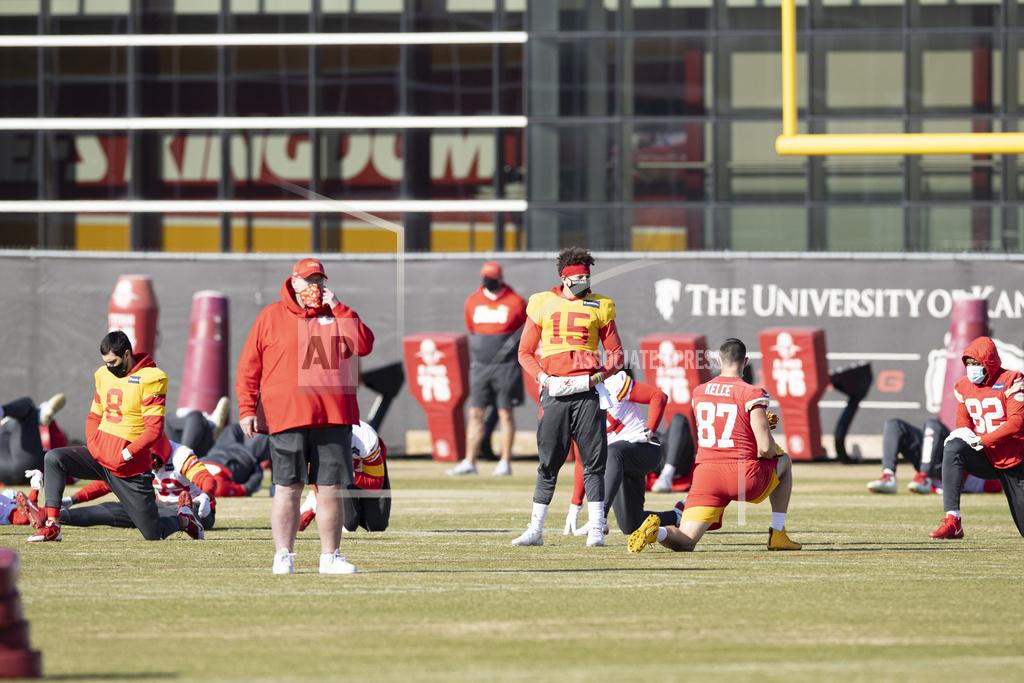 Steve Sanders Kansas City Chiefs Head Coach Andy Reid and Quarterback Patrick Mahomes (15) look on during NFL football practice Wednesday February 2, 2021 in Kansas City, Mo. The Chiefs will face the Tampa Bay Buccaneers in Super Bowl 55. (Steve Sanders/Kansas City Chiefs via AP)