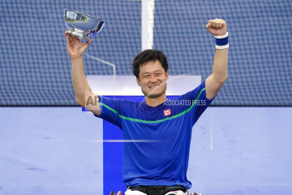 Frank Franklin Ii Japan's Shingo Kunieda holds the championship trophy after defeating Alfie Hewett, of the United Kingdom, in the final of the US Open tennis championships Sunday, Sept. 13, 2020, in New York.(AP Photo/Frank Franklin II)
