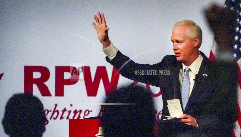 Ebony Cox U.S. Sen. Ron Johnson waves to supporters at the Wisconsin Republican Convention, Saturday, May 21, 2022, in Milwaukee, Wis. (Ebony Cox/Milwaukee Journal-Sentinel via AP)
