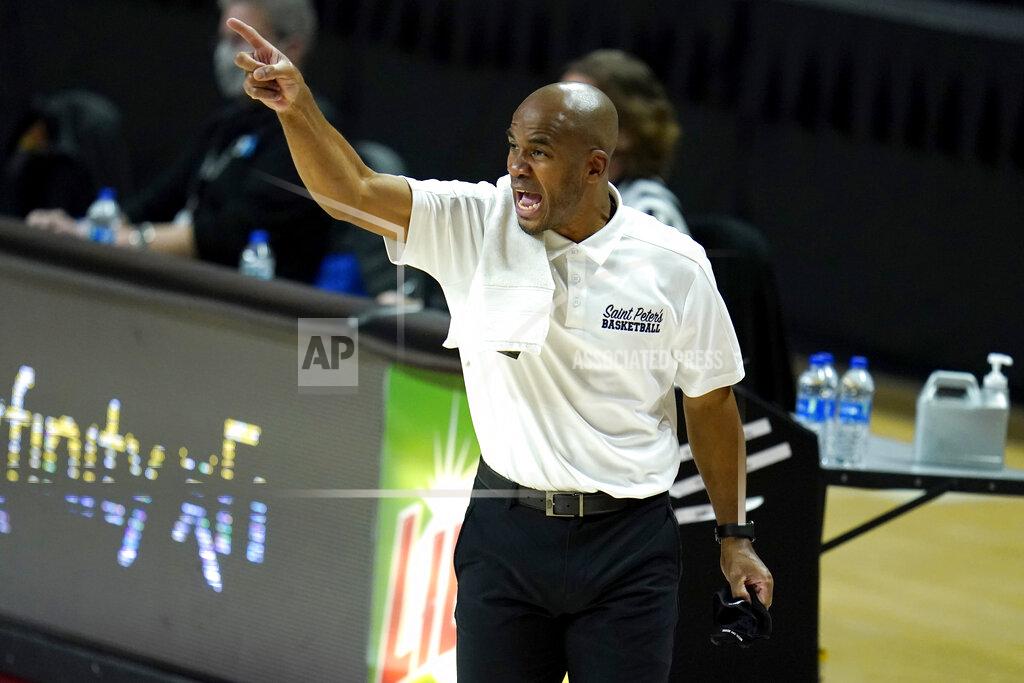 Julio Cortez St. Peter's head coach Shaheen Holloway reacts during the first half of an NCAA college basketball game against Maryland, Friday, Dec. 4, 2020, in College Park, Md. (AP Photo/Julio Cortez)