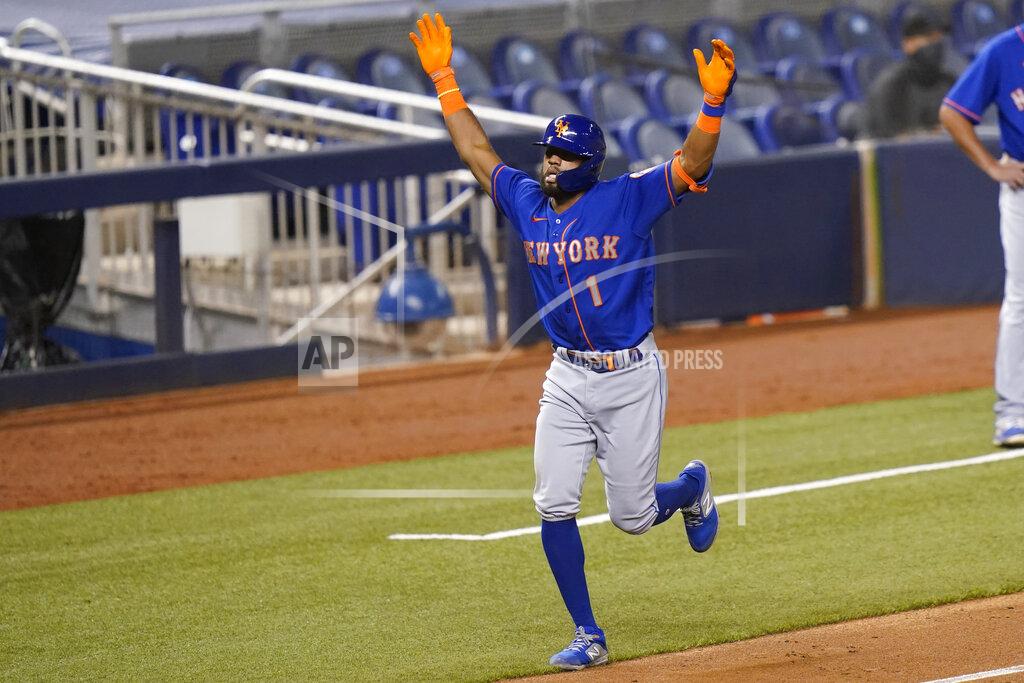 Lynne Sladky New York Mets' Amed Rosario (1) reacts as he runs the bases after hitting a solo home during the seventh inning of a baseball game against the Miami Marlins, Tuesday, Aug. 18, 2020, in Miami. (AP Photo/Lynne Sladky)