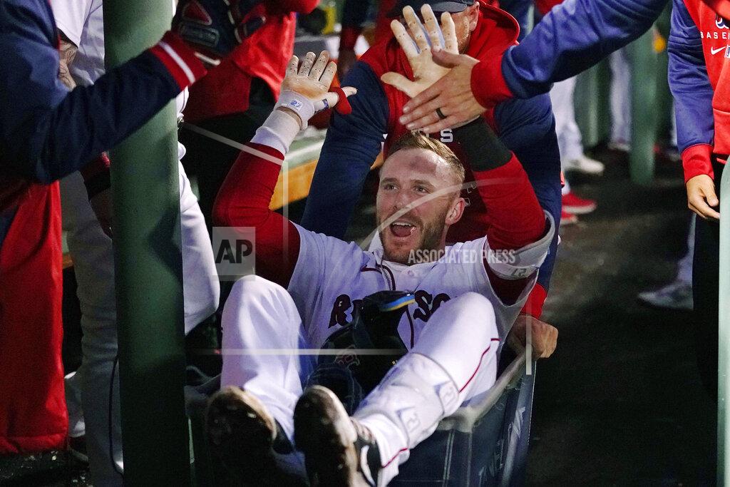 Charles Krupa Boston Red Sox's Trevor Story is congratulated after his second two-run home run of the night, during the third inning of the team's baseball game against the Seattle Mariners at Fenway Park, Thursday, May 19, 2022, in Boston. (AP Photo/Charles Krupa)
