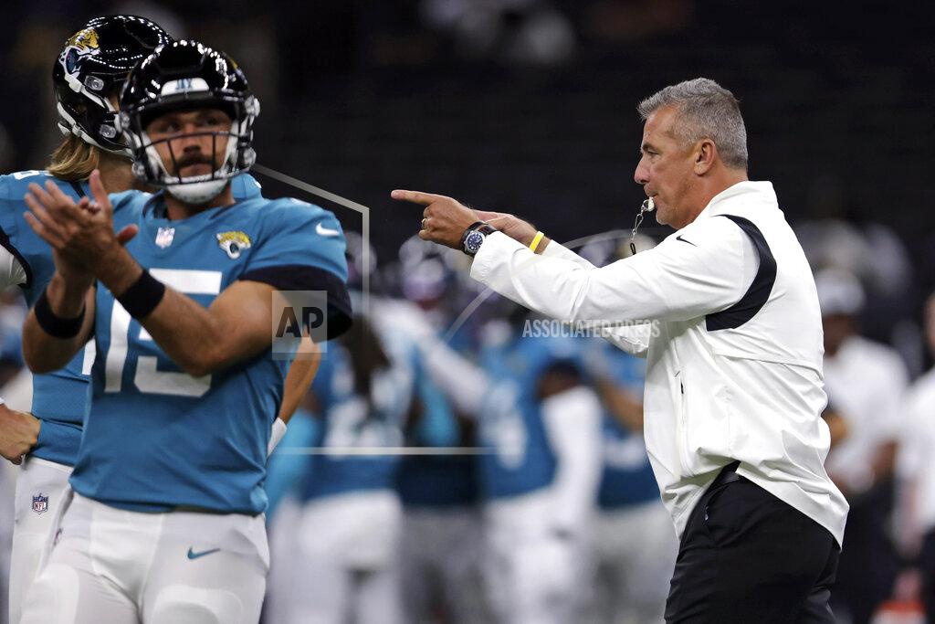 Brett Duke FILE - In this Monday, Aug. 23, 2021, file photo, Jacksonville Jaguars head coach Urban Meyer directs his team as they warm up for a preseason NFL preseason football game against the New Orleans Saints in New Orleans. In many regards, Meyer runs the Jaguars like a college program It’s what he knows even though he spent a year studying the NFL before he ended a brief coaching retirement. It’s also worked at every previous stop, so no one is questioning his methods. (AP Photo/Brett Duke, File)