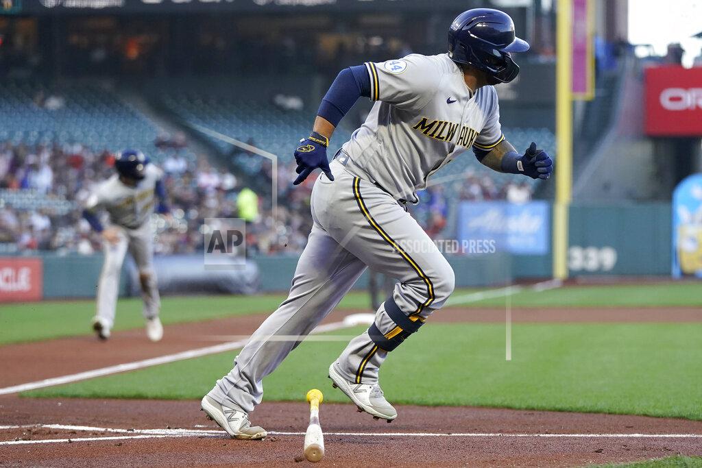 Jeff Chiu Milwaukee Brewers' Omar Narvaez runs to first base after hitting an RBI-single against the San Francisco Giants during the first inning of a baseball game in San Francisco, Monday, Aug. 30, 2021. (AP Photo/Jeff Chiu)