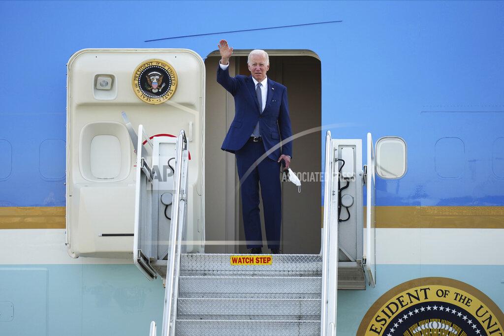 Eugene Hoshiko U.S. President Joe Biden waves before he boards Air Force One at Yokota Air Base in Fussa, Japan, Tuesday, May 24, 2022. (AP Photo/Eugene Hoshiko)