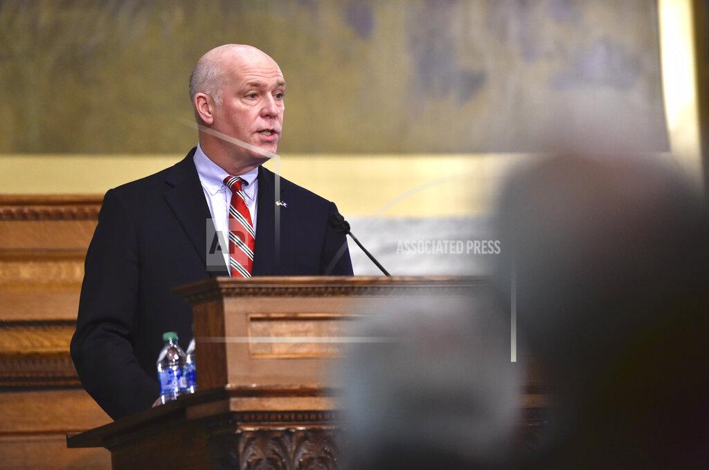 Montana Gov. Greg Gianforte addresses the Legislature on Thursday, Jan. 28, 2021, in the House Chamber of the State Capitol in Helena, Mont. The state's first Republican governor in 16 years delivered his first State of the State address Thursday evening. (Thom Bridge/Independent Record via AP)