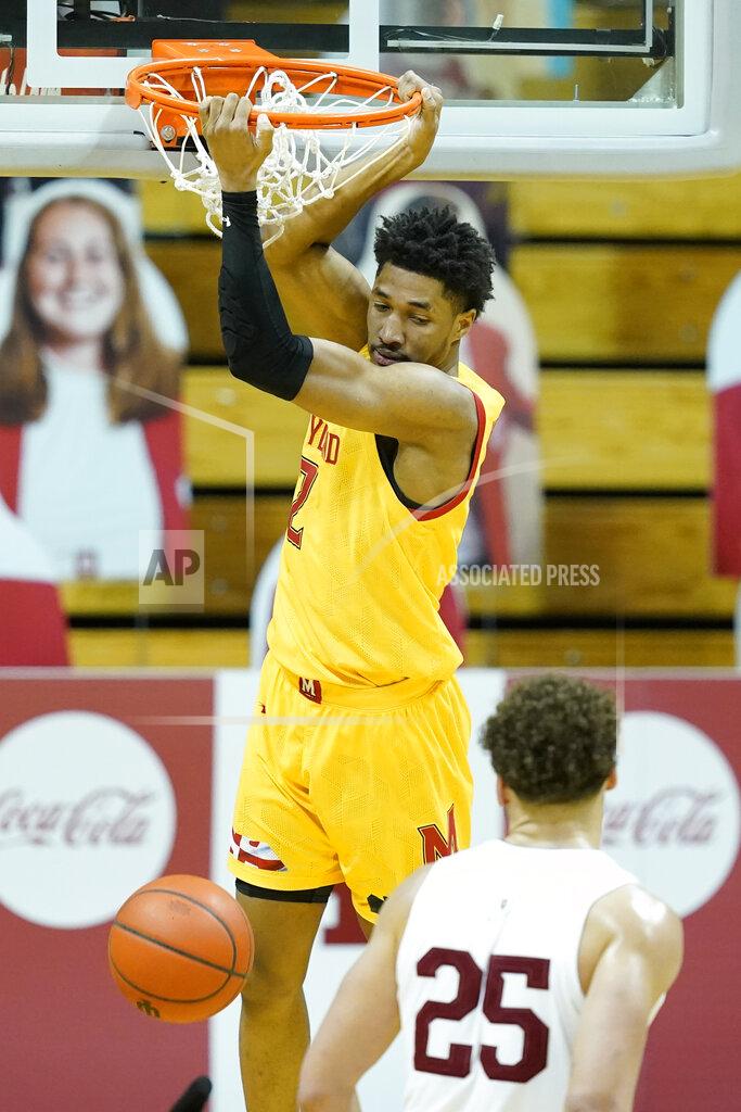 Darron Cummings Maryland guard Aaron Wiggins (2) dunks against Indiana forward Race Thompson (25) during the second half of an NCAA college basketball game, Monday, Jan. 4, 2021, in Bloomington, Ind. (AP Photo/Darron Cummings)