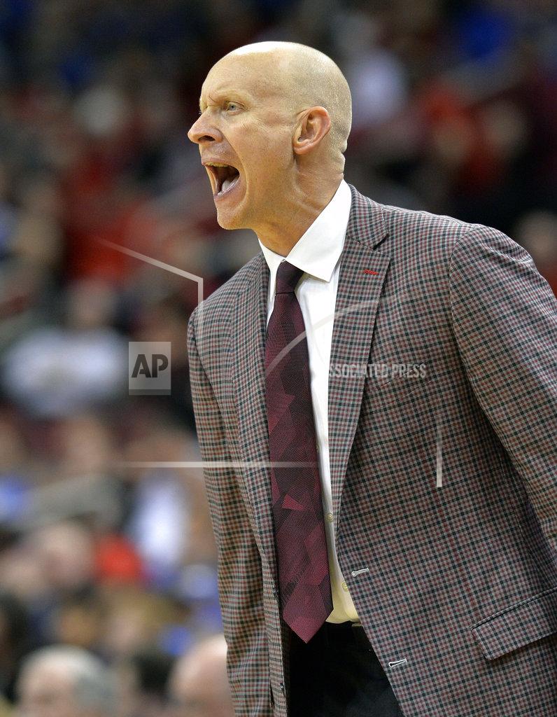 Timothy D. Easley Louisville head coach Chris Mack shouts at his team during the second half of an NCAA college basketball game against Kentucky in Louisville, Ky., Saturday, Dec. 29, 2018. Kentucky won 71-58. (AP Photo/Timothy D. Easley)