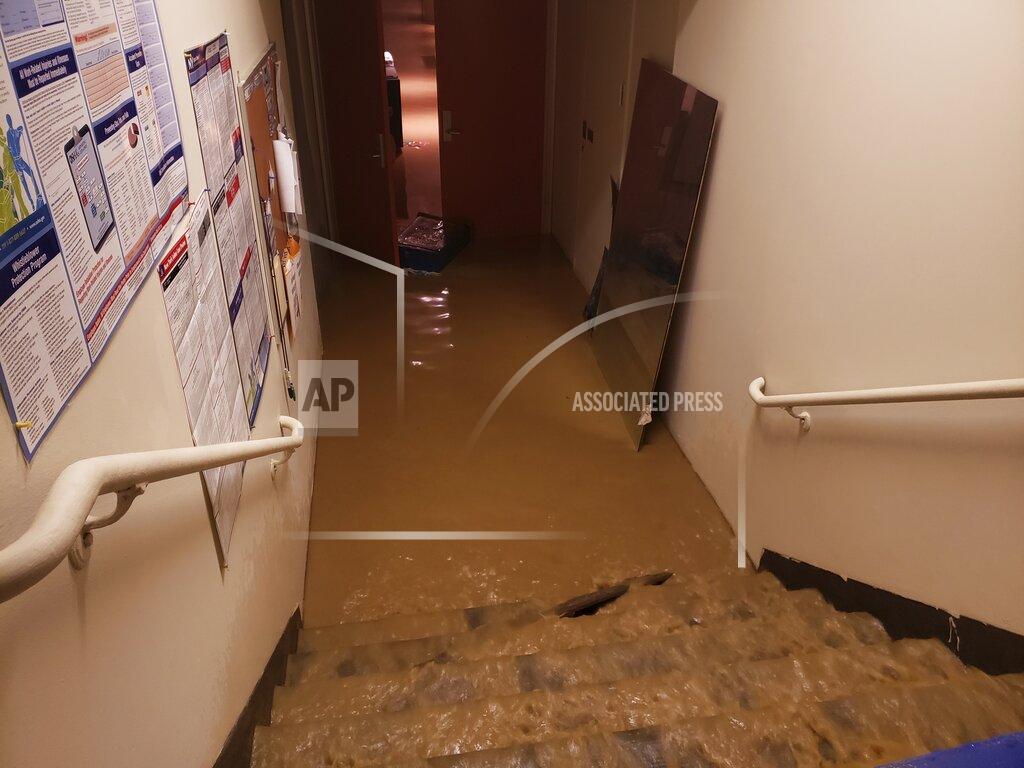 Uncredited This Monday, Jan. 4, 2020 photo provided by Saint Peter's Lutheran Church shows flood damage in their church in the Manhattan borough of New York after a water main break. The Lutheran church was already reeling from the COVID-19 deaths of more than 60 congregation members during the pandemic. (Saint Peter's Lutheran Church via AP)