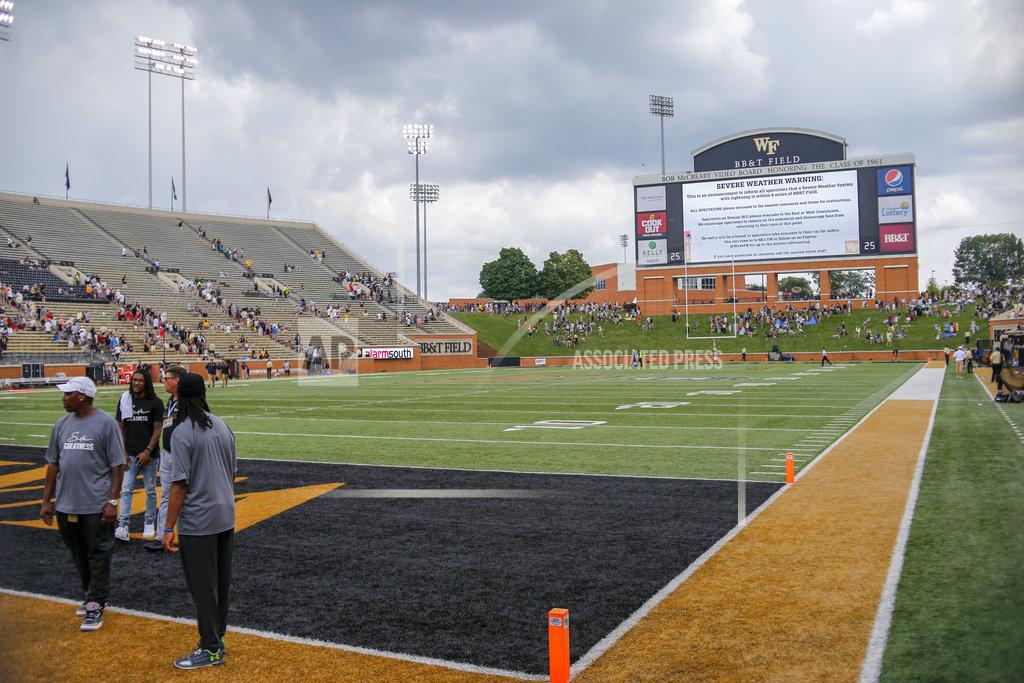 Nell Redmond Wake Forest's BB&T Field is evacuated during a severe weather delay in the second half of an NCAA college football game between Wake Forest and Towson in Winston-Salem, N.C., Saturday, Sept. 8, 2018. (AP Photo/Nell Redmond)