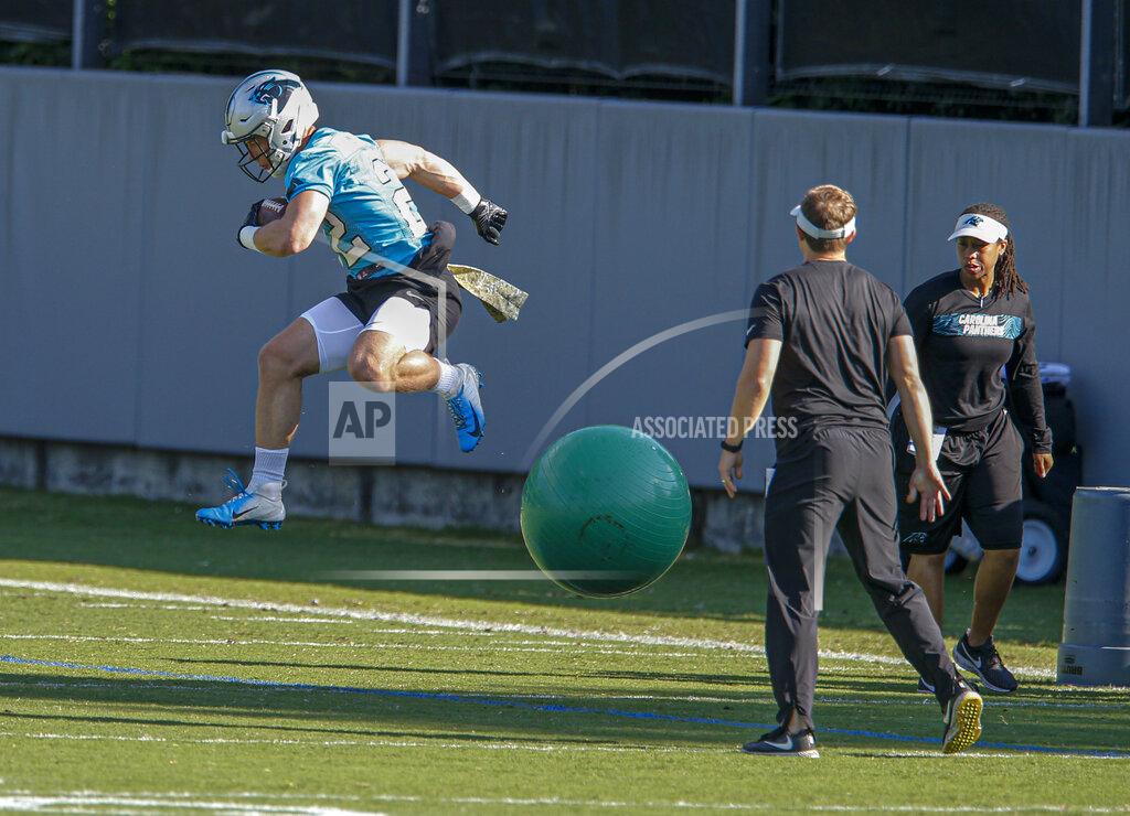 Nell Redmond Carolina Panthers running back Christian McCaffrey jumps over a ball during an NFL football team practice in Charlotte, N.C., Tuesday, June 11, 2019. (AP Photo/Nell Redmond)