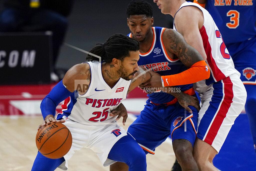 Carlos Osorio Detroit Pistons guard Derrick Rose (25) is defended by New York Knicks guard Elfrid Payton during the first half of a preseason NBA basketball game Friday, Dec. 11, 2020, in Detroit. (AP Photo/Carlos Osorio)