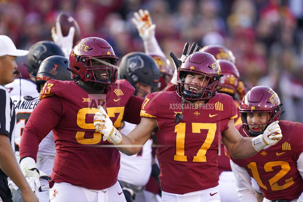 Charlie Neibergall Iowa State defensive back Beau Freyler (17) celebrates with teammate Iowa State defensive tackle Isaiah Lee (93) after a tackle during the second half of an NCAA college football game against Oklahoma State, Saturday, Oct. 23, 2021, in Ames, Iowa. Iowa State won 24-21. (AP Photo/Charlie Neibergall)