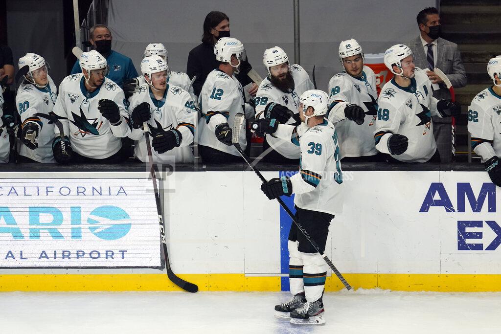 Ashley Landis San Jose Sharks center Logan Couture (39) celebrates after scoring the winning goal in an overtime shootout to win an NHL hockey game 4-3 against the Los Angeles Kings Wednesday, Feb. 10, 2021, in Los Angeles. (AP Photo/Ashley Landis)