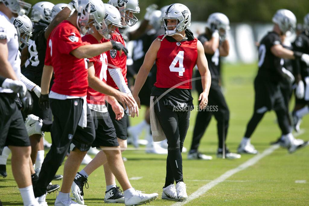 Carr back for 6th year as Raiders QB after offseason rumors