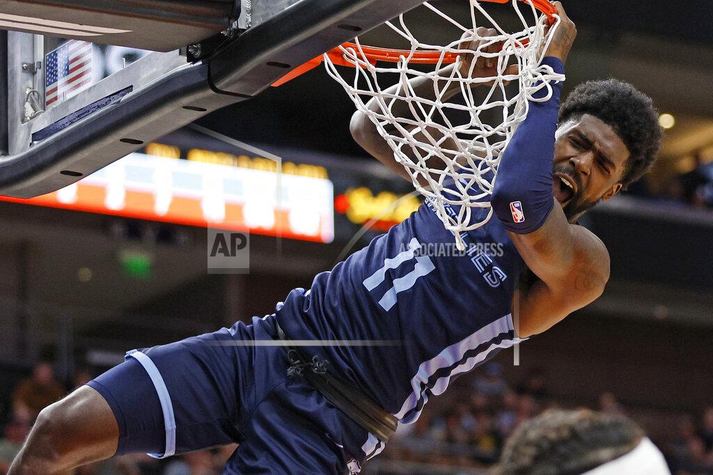 Jeff Swinger Memphis Grizzlies guard Shaq Buchanan reacts after a dunk against the Oklahoma City Thunder during the first half of an NBA summer league basketball game Wednesday, July 6, 2022, in Salt Lake City. (AP Photo/Jeff Swinger)