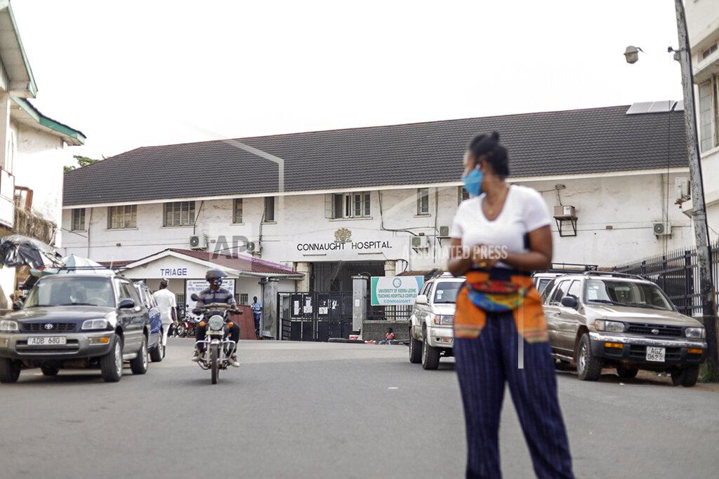 The Connaught Hospital is seen in the capital Freetown, Sierra Leone Friday, May 8, 2020. Despite the loss of colleagues, Dr. Mamadu Baldeh, one of only four physicians managing the COVID-19 unit at the hospital, is fighting not only to save his coronavirus patients but also to provide quality care for those afflicted with other infectious diseases as he and other health care workers fight for a better system. (Vicki Remoe/VRC Marketing via AP)