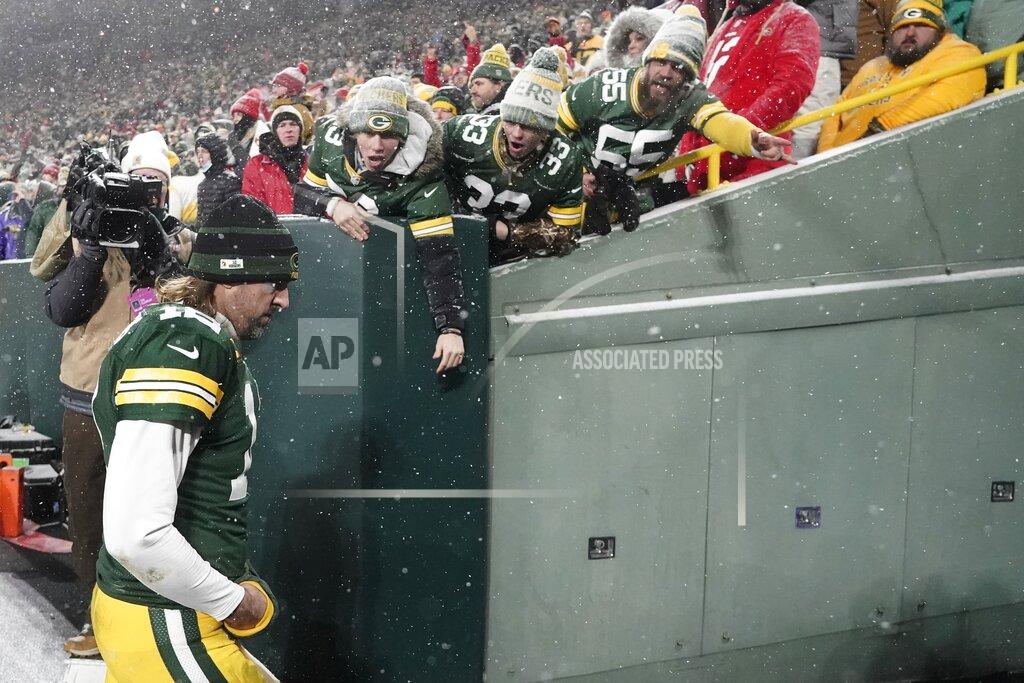 Morry Gash Green Bay Packers' Aaron Rodgers leaves the field after an NFC divisional playoff NFL football game against the San Francisco 49ers Saturday, Jan. 22, 2022, in Green Bay, Wis. The 49ers won 13-10 to advance to the NFC Chasmpionship game. (AP Photo/Morry Gash)