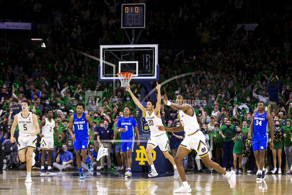 Robert Franklin Notre Dame players celebrate on the court following their win over Kentucky in an NCAA college basketball game Saturday, Dec. 11, 2021, in South Bend, Ind. (AP Photo/Robert Franklin)