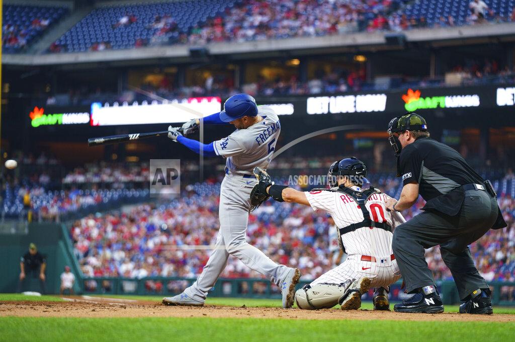 Chris Szagola Los Angeles Dodgers' Freddie Freeman hits a two-run single during the second inning of the team's baseball game against the Philadelphia Phillies, Friday, May 20, 2022, in Philadelphia. (AP Photo/Chris Szagola)