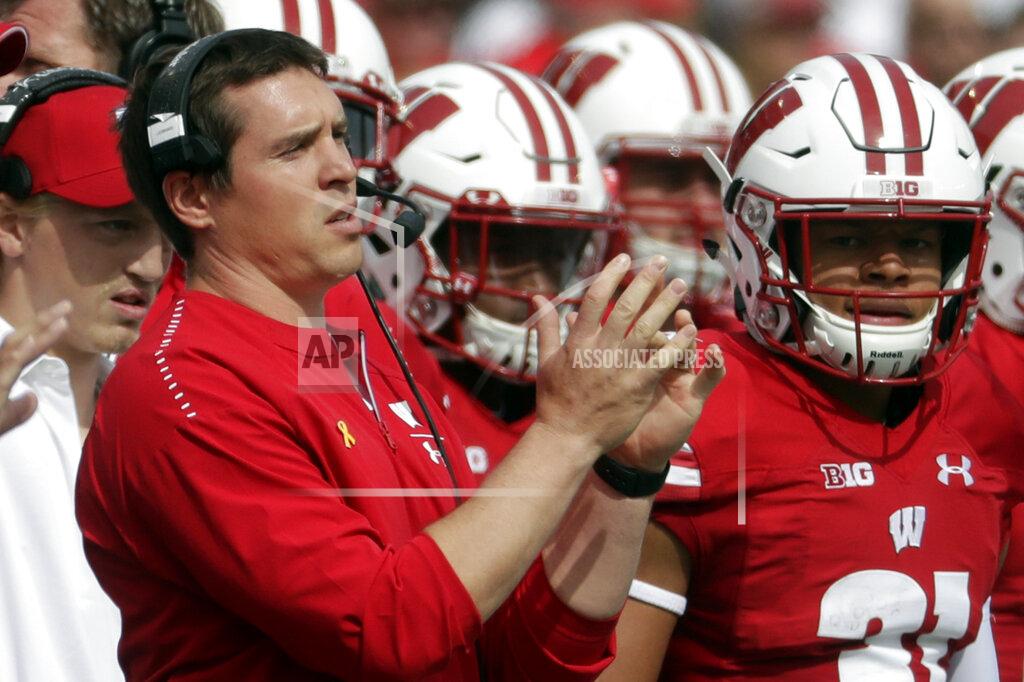 Morry Gash FILE - In this Sept. 8, 2018, file photo, Wisconsin defensive coordinator Jim Leonhard watches during the first half of an NCAA college football game against New Mexico in Madison, Wis. In an era when the College Football Playoff increasingly features the nation’s highest-scoring teams, this year’s Big Ten race shows defense still matters. (AP Photo/Morry Gash, File)